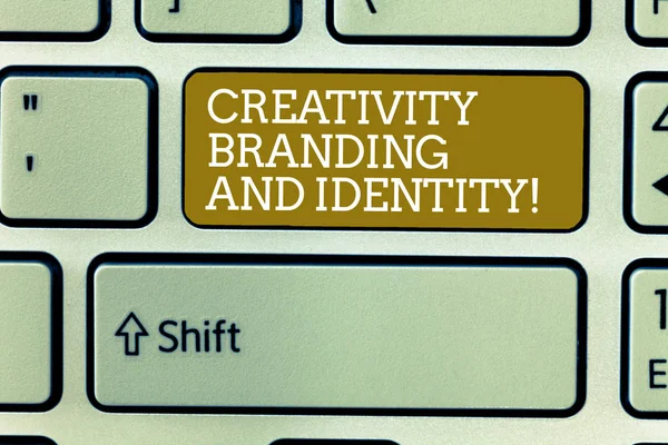 Word writing text Creativity Branding And Identity. Business concept for Marketing advertising design strategies Keyboard key Intention to create computer message, pressing keypad idea.