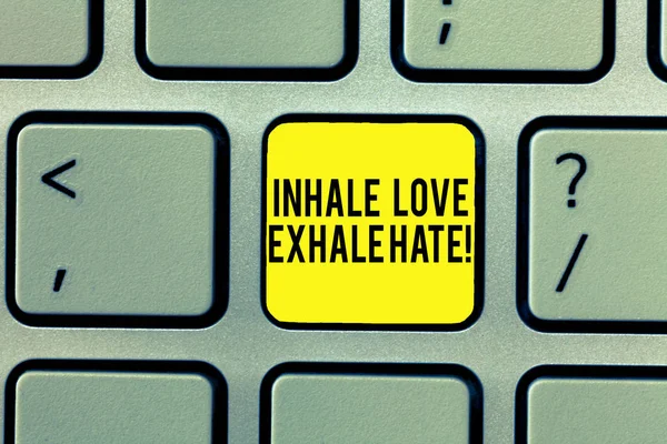 Word writing text Inhale Love Exhale Hate. Business concept for Positive do not be full of resentment Relax Keyboard key Intention to create computer message, pressing keypad idea.