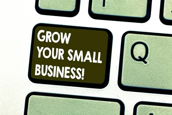 Text sign showing Grow Your Small Business. Conceptual photo company generates positive cash flow Earn Keyboard key Intention to create computer message pressing keypad idea.