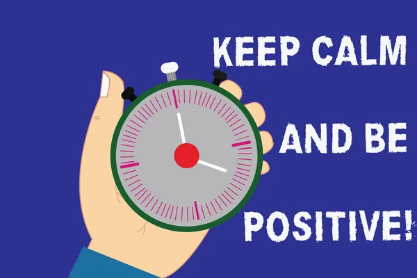 Writing note showing Keep Calm And Be Positive. Business photo showcasing Stay calmed positivity happiness smiling Hu analysis Hand Holding Stop Watch Timer with Start Stop Button. — Stock Photo, Image