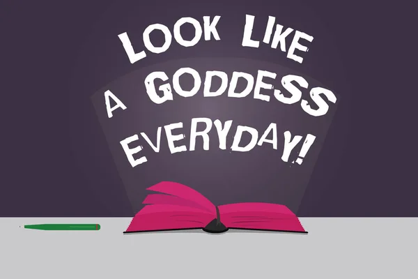 Texto de escritura de palabras Look Like A Goddess Everyday. Concepto de negocio para ser atractivo hermoso glamoroso todo el tiempo Páginas de color de la foto del libro abierto en la mesa con la pluma y la luz del haz de deslumbramiento . — Foto de Stock