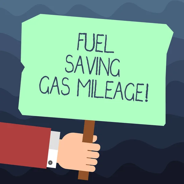 Text sign showing Fuel Saving Gas Mileage. Conceptual photo Expending less money in vehicle expenses gas savings Hu analysis Hand Holding Blank Colored Placard with Stick photo Text Space.