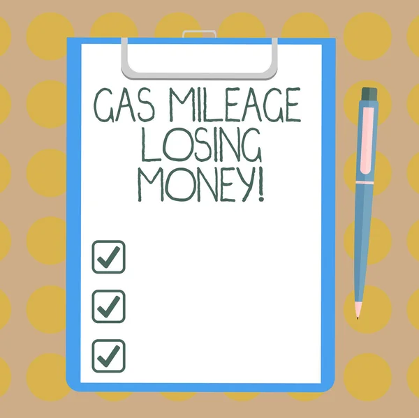 Word writing text Gas Mileage Losing Money. Business concept for Long road high gas fuel costs financial losses Blank Sheet of Bond Paper on Clipboard with Click Ballpoint Pen Text Space.