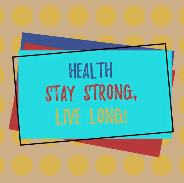 Writing note showing Health Stay Strong Live Long. Business photo showcasing Have a healthy life selfcare prevention Pile of Blank Rectangular Outlined Different Color Construction Paper.