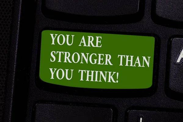 Word writing text You Are Stronger Than You Think. Business concept for Adaptability Strength to overcome obstacles Keyboard key Intention to create computer message pressing keypad idea.