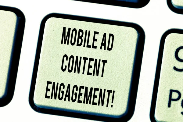 Text sign showing Mobile Ad Content Engagement. Conceptual photo Social media advertising promotion strategies Keyboard key Intention to create computer message pressing keypad idea.
