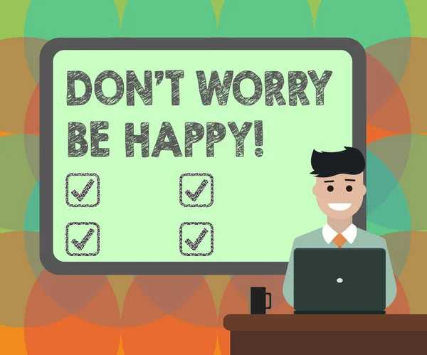 Word writing text Don T Worry Be Happy. Business concept for Cheerful be positive relaxed inspired motivated Blank Bordered Board behind Man Sitting Smiling with Laptop Mug on Desk.