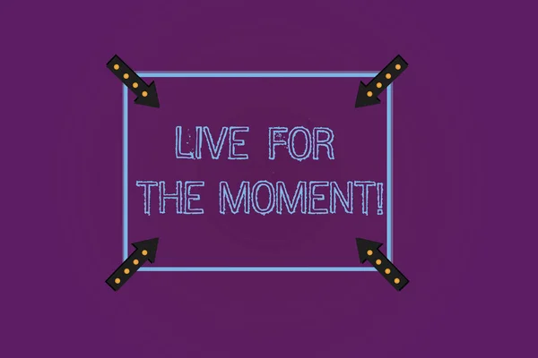 Writing note showing Live For The Moment. Business photo showcasing Enjoy today happy lifestyle relaxed be motivated Square Outline with Corner Arrows Pointing Inwards on Color Background.