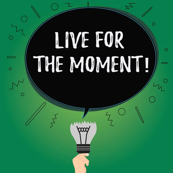 Text sign showing Live For The Moment. Conceptual photo Enjoy today happy lifestyle relaxed be motivated Blank Oval Color Speech Bubble Above a Broken Bulb with Failed Idea icon.