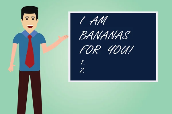 Handwriting text writing I Am Bananas For You. Concept meaning To be crazy for someone in loved happy emotion Man with Tie Standing Talking Presenting Blank Color Square Board photo. — Stock Photo, Image