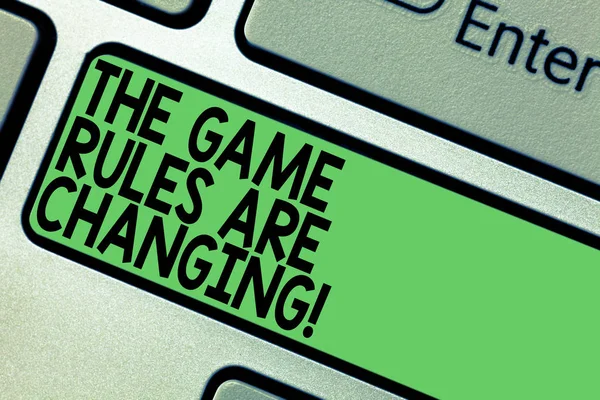 Text sign showing The Game Rules Are Changing. Conceptual photo Changes in established competition agreements Keyboard key Intention to create computer message pressing keypad idea