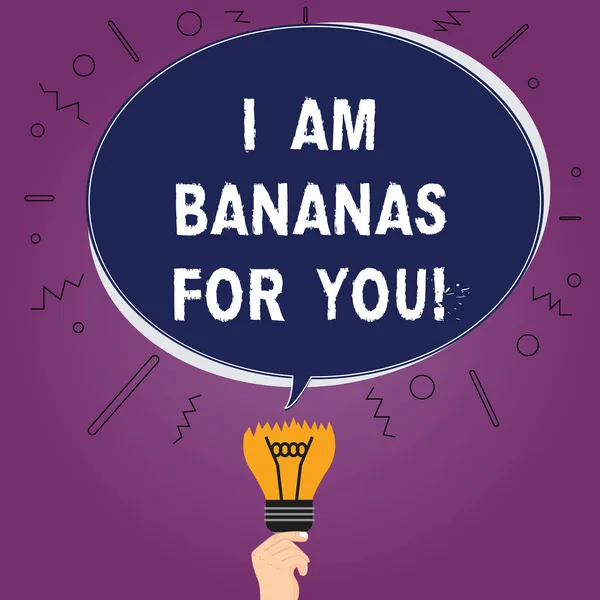 Text sign showing I Am Bananas For You. Conceptual photo To be crazy for someone in loved happy emotion Blank Oval Color Speech Bubble Above a Broken Bulb with Failed Idea icon.