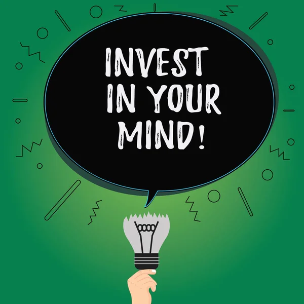 Text sign showing Invest In Your Mind. Conceptual photo Get new knowledge more education improve yourself Blank Oval Color Speech Bubble Above a Broken Bulb with Failed Idea icon.