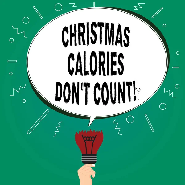 Handwriting text writing Christmas Calories Don T Count. Concept meaning Eat whatever you want in holiday seasons Blank Oval Color Speech Bubble Above a Broken Bulb with Failed Idea icon.