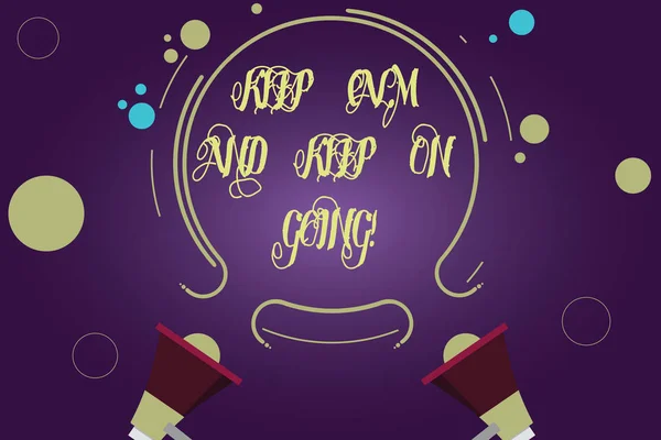 Writing note showing Keep Calm And Keep On Going. Business photo showcasing Get relaxed and continue moving taking action Two Megaphone and Circular Outline with Small on Color Background.