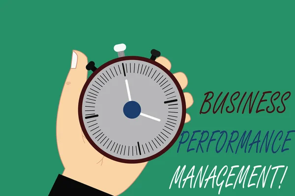 Word pisanie tekstu Business Perforanalysisce Management. Koncepcja biznesowa, ustawiania i monitorowania cele korporacyjne analizy Hu ręka gospodarstwa mechaniczne Stop Watch zegar z przycisk Start Stop. — Zdjęcie stockowe