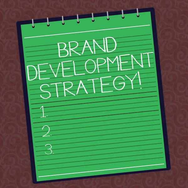 Text sign showing Brand Development Strategy. Conceptual photo analysis and planning of brand perceive in market Lined Spiral Top Color Notepad photo on Watermark Printed Background.