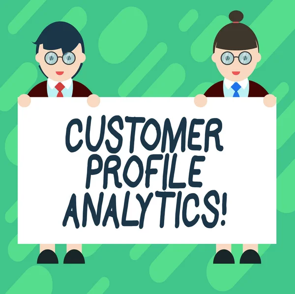 Conceptual hand writing showing Customer Profile Analytics. Business photo showcasing Customer profile or target market analysis Male and Female in Uniform Holding Placard Banner Text Space.