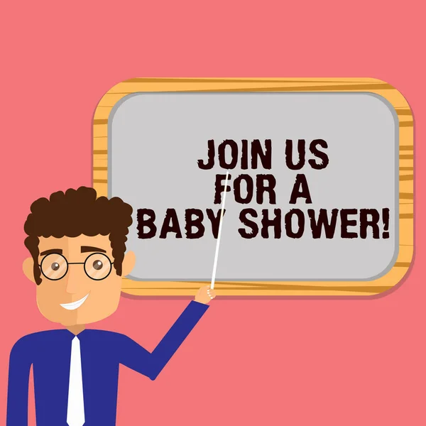 Conceptual hand writing showing Join Us For A Baby Shower. Business photo showcasing Invitation to celebrate the next baby coming Man Holding Stick Pointing to Wall Mounted Blank Color Board