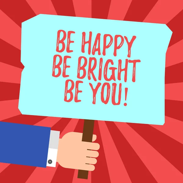 Handwriting text Be Happy Be Bright Be You. Concept meaning Selfconfidence good attitude enjoy cheerful Hu analysis Hand Holding Blank Colored Placard with Stick photo Text Space.