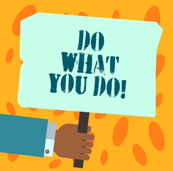 Text sign showing Do What You Do. Conceptual photo Make things you are good at strive for excellence success Hu analysis Hand Holding Blank Colored Placard with Stick photo Text Space.