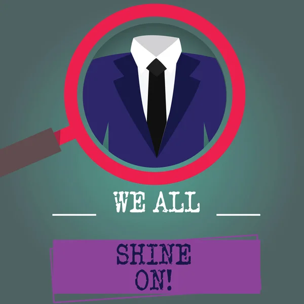 Texto de escritura de palabras We All Shine On. Concepto de negocio para todo el mundo tiene un brillo Brillante brillante Lupa Motivacional foto Ampliación Inspección de un esmoquin y etiqueta abajo . —  Fotos de Stock