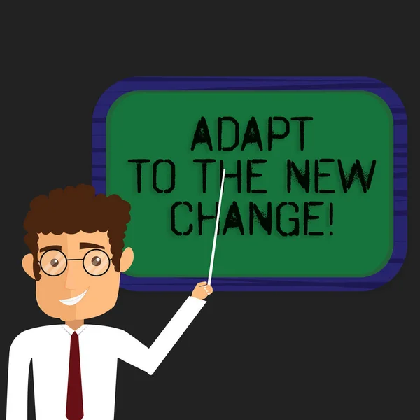 Writing note showing Adapt To The New Change. Business photo showcasing Get used to changes different strategies situations Man Standing Holding Stick Pointing to Wall Mounted Blank Color Board. — Stock Photo, Image