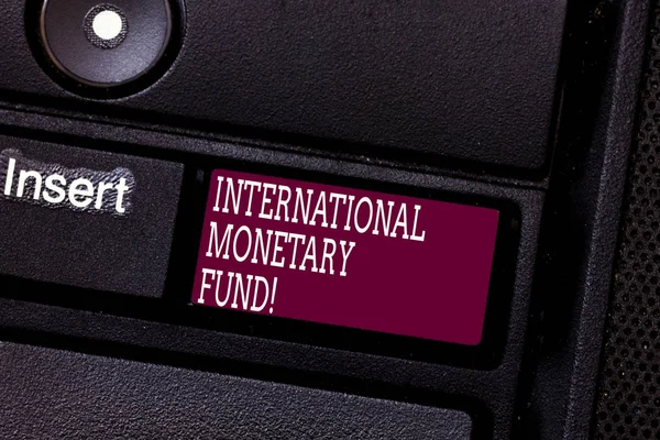 Word writing text International Monetary Fund. Business concept for promotes international financial stability Keyboard key Intention to create computer message pressing keypad idea.