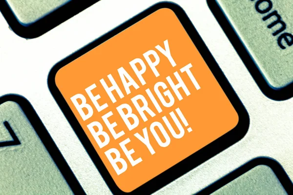 Text sign showing Be Happy Be Bright Be You. Conceptual photo Selfconfidence good attitude enjoy cheerful Keyboard key Intention to create computer message pressing keypad idea.