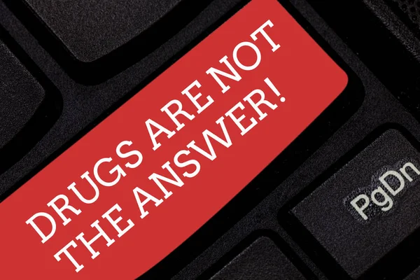 Writing note showing Drugs Are Not The Answer. Business photo showcasing Addiction problems good advice to help health Keyboard key Intention to create computer message pressing keypad idea.