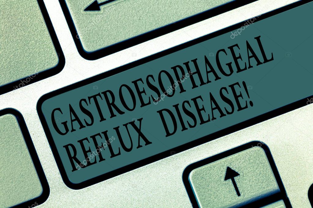 Word writing text Gastroesophageal Reflux Disease. Business concept for digestive disorder Burning chest pain Keyboard key Intention to create computer message pressing keypad idea.