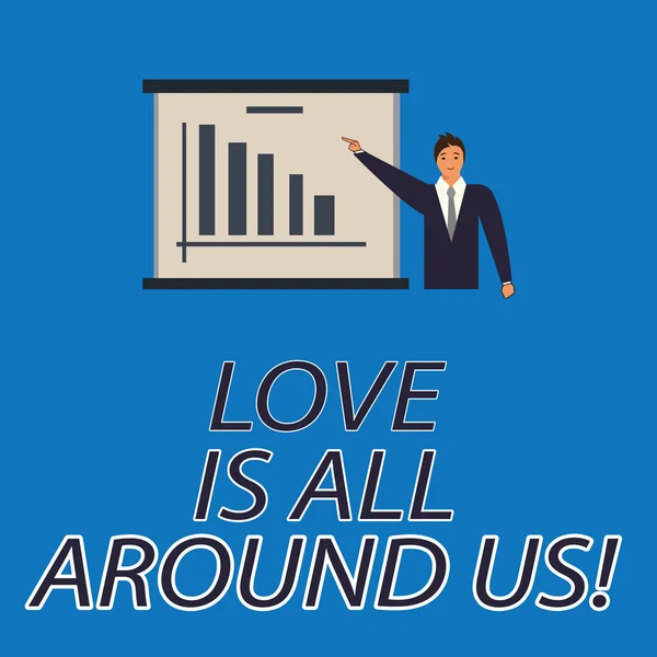 Text sign showing Love Is All Around Us. Conceptual photo Inspiration motivation roanalysistic feelings emotions Man in Business Suit Standing Pointing a Board with Bar Chart Copy Space.