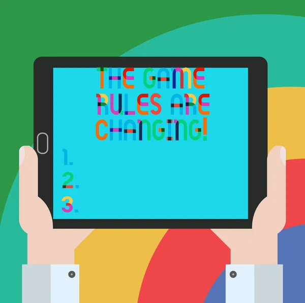 Konceptuella hand skriva visar The spelet regler förändras. Företag foto skylta förändringar i etablerade konkurrens avtal Hu analys håller tablett Smartphone displayenhet foto. — Stockfoto