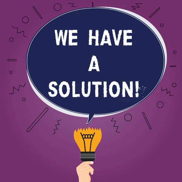 Text sign showing We Have A Solution. Conceptual photo Offering to bring you the assistance help you need Blank Oval Color Speech Bubble Above a Broken Bulb with Failed Idea icon.