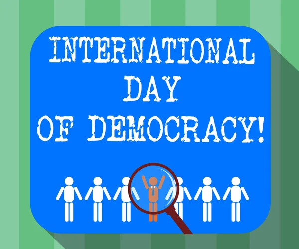 手書きテキスト国際民主主義日 概念のダミー行を世界虫眼鏡上選ばれた人間図の中で 胡分析議決権祝う意味 — ストック写真