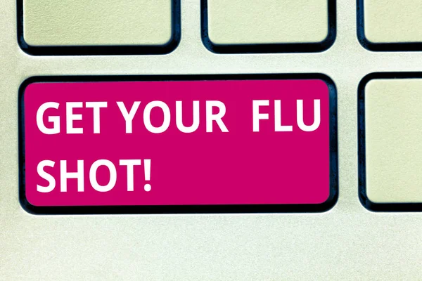 Text sign showing Get Your Flu Shot. Conceptual photo Have a vaccination for avoiding being sick immunization Keyboard key Intention to create computer message pressing keypad idea.