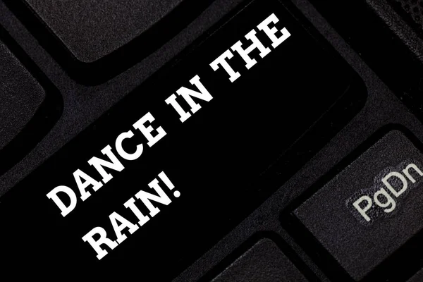 Word writing text Dance In The Rain. Business concept for Enjoy the rainy day childish activities happy dancing Keyboard key Intention to create computer message pressing keypad idea.