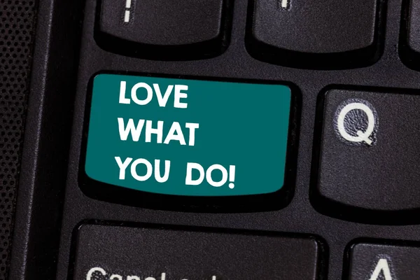 Text sign showing Love What You Do. Conceptual photo Make things that you like enjoy with positive attitude Keyboard key Intention to create computer message pressing keypad idea.