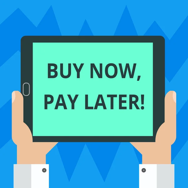 Text sign showing Buy Now Pay Later. Conceptual photo Credit to purchase things payment time after buying Hu analysis Hand Holding Blank Screen Tablet Smartphone Display Unit photo.