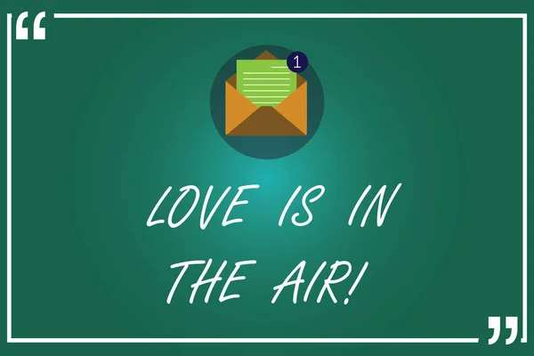 Escribir texto a mano Love Is In The Air. Concepto que significa emociones roanalíticas situaciones nuevas relaciones de pareja sobre abierto con papel Nuevo mensaje de correo electrónico dentro de la cita Marcar esquema . — Foto de Stock