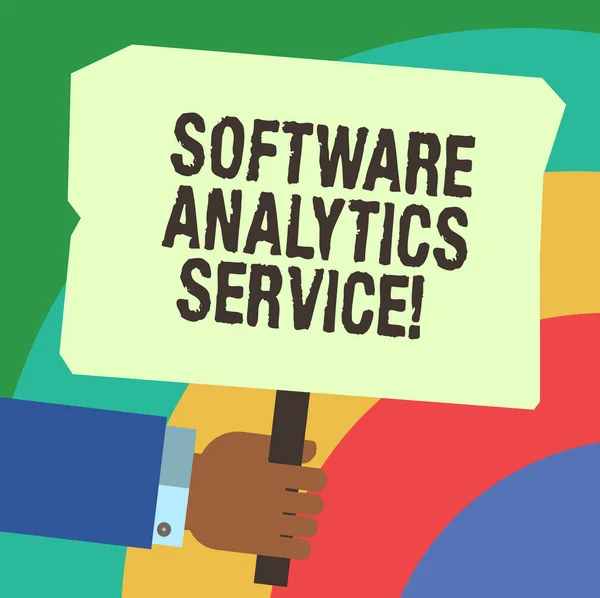 Handwriting text writing Software Analytics Service. Concept meaning Used to enhance operations and generate revenue Hu analysis Hand Holding Blank Colored Placard with Stick photo Text Space.