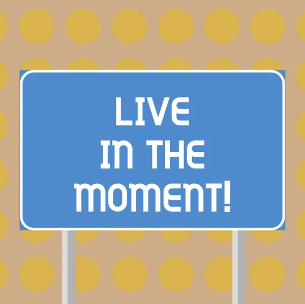 Word writing text Live In The Moment. Business concept for Be inspired motivated enjoy today happy moments Blank Rectangular Outdoor Color Signpost photo with Two leg and Outline.