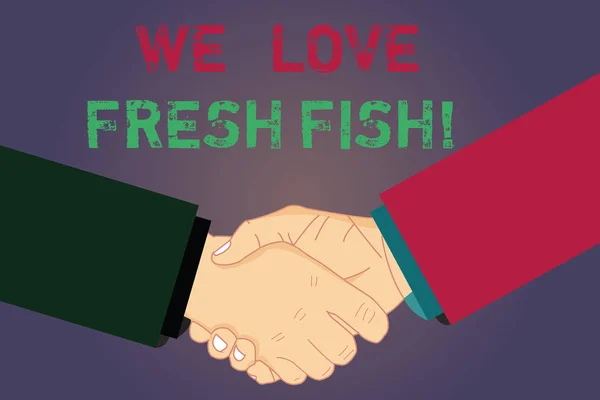 Handskrift text skriver vi kärlek färsk fisk. Begreppet mening fiskälskare hälsosam mat Marina matlagning måltidskunskap Hu analys skaka händerna på avtalet tecken av respekt och ära. — Stockfoto