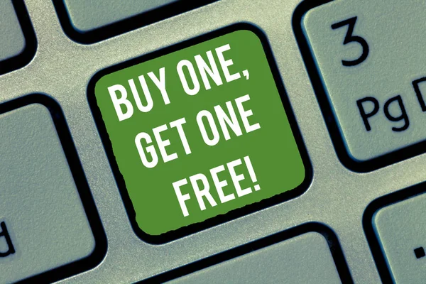 Word writing text Buy One Get One Free. Business concept for Promotion discount special offering in gift card Keyboard key Intention to create computer message, pressing keypad idea.
