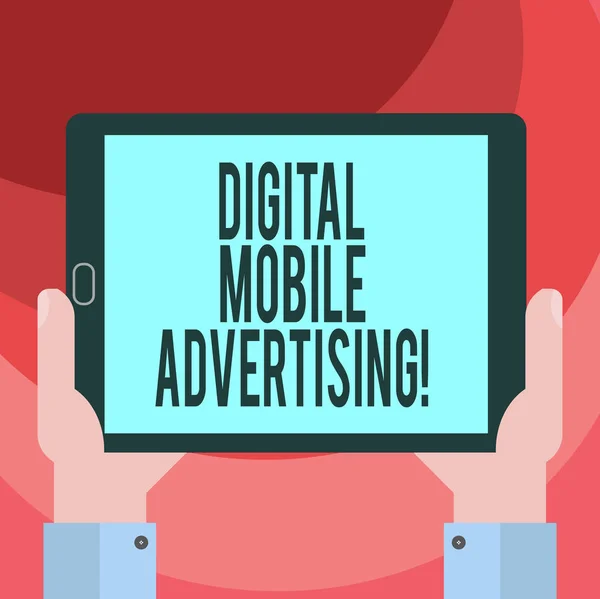 Text sign showing Digital Mobile Advertising. Conceptual photo form of publicity via wireless phones and devices Hu analysis Hand Holding Blank Screen Tablet Smartphone Display Unit photo.