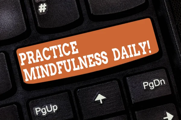 Handwriting text writing Practice Mindfulness Daily. Concept meaning Cultivating focus awareness on the present Keyboard key Intention to create computer message pressing keypad idea.
