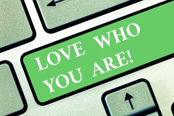 Writing note showing Love Who You Are. Business photo showcasing Expressing roanalysistic feelings and positive emotions Keyboard key Intention to create computer message pressing keypad idea.