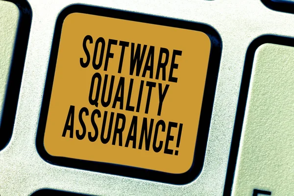 Handwriting text writing Software Quality Assurance. Concept meaning Ensuring quality in software engineering process Keyboard key Intention to create computer message pressing keypad idea.