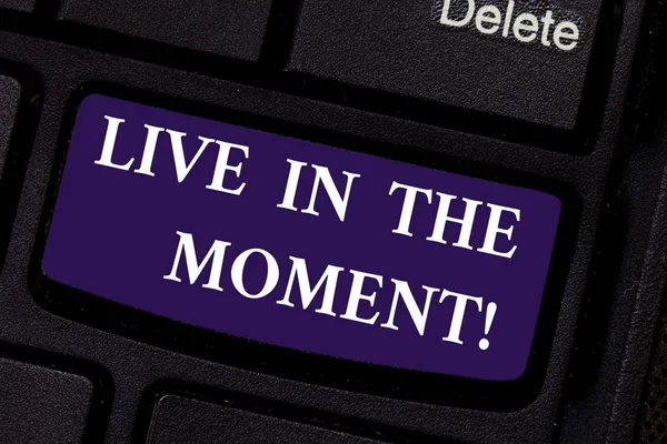 Writing note showing Live In The Moment. Business photo showcasing Be inspired motivated enjoy today happy moments Keyboard key Intention to create computer message pressing keypad idea.