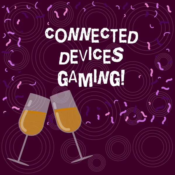 Writing note showing Connected Devices Gaming. Business photo showcasing devices operate interactively and autonomously Filled Wine Glass for Celebration with Scattered Confetti photo.